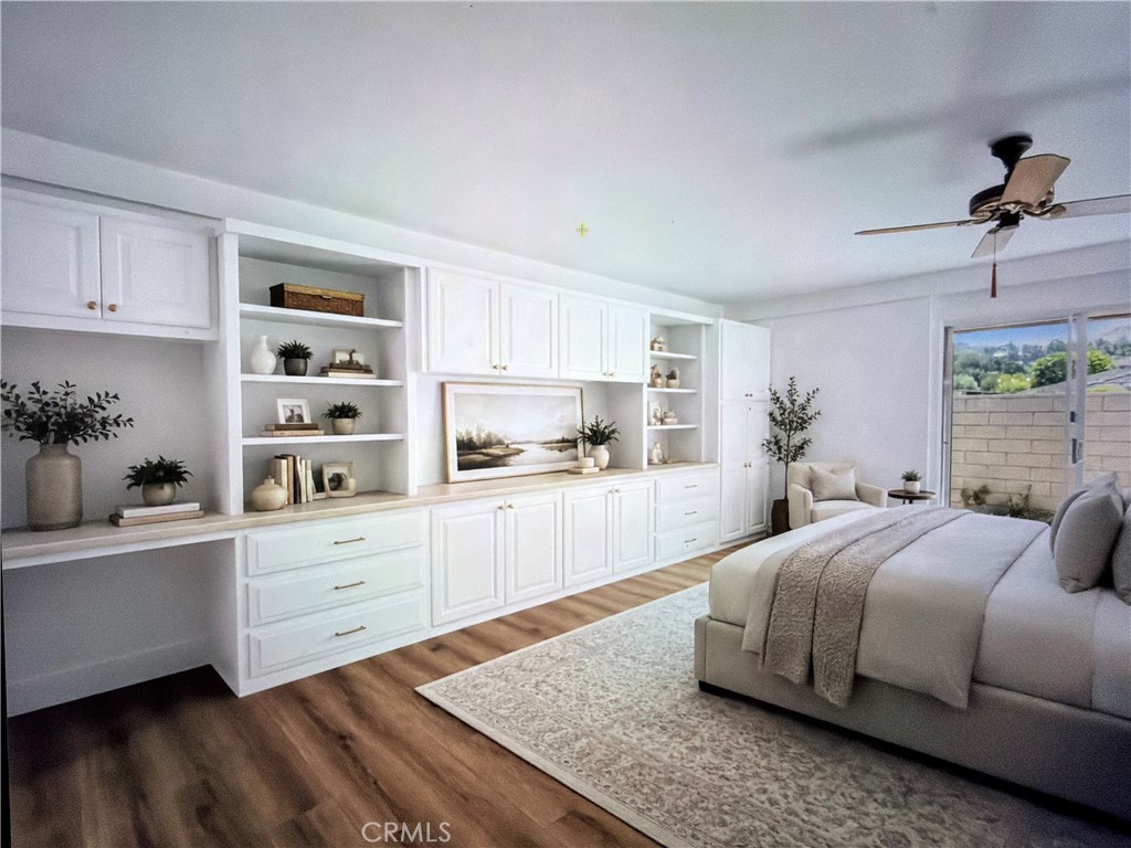 Virtually Staged Primary Bedroom with cabinet painted white - 27121 Calle Caballero B, San Juan Capistrano CA 92675 - photo 9