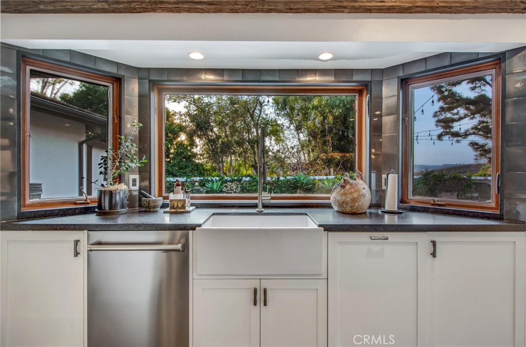 Enjoy clean up with fabulous views onto the private side patio - 27151 Mission Hills Drive, San Juan Capistrano CA 92675 - photo 10