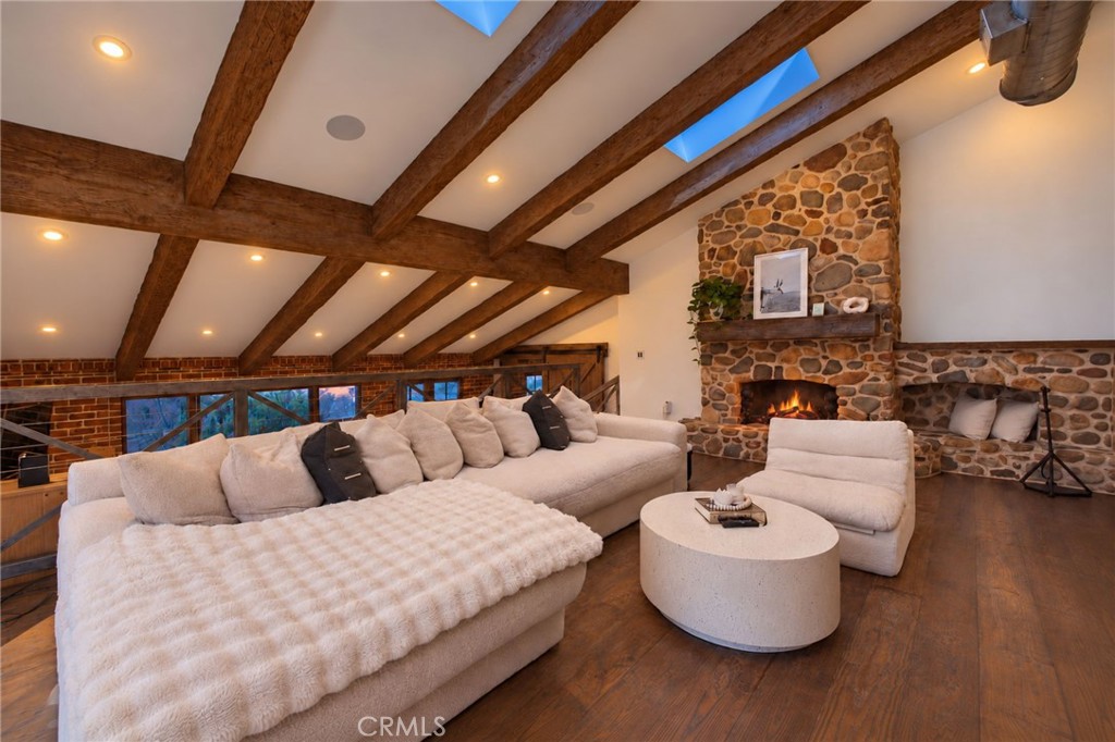 The Family Room with Stone Fireplace - 27151 Mission Hills Drive, San Juan Capistrano CA 92675 - photo 16