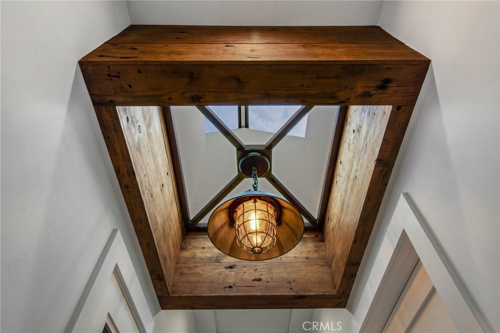 Custom trim on sky lights highlight the hallway - 27151 Mission Hills Drive, San Juan Capistrano CA 92675 - photo 19