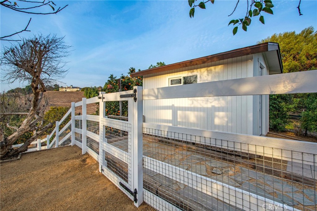 Side entrance to the property with Storage shed - 27151 Mission Hills Drive, San Juan Capistrano CA 92675 - photo 23