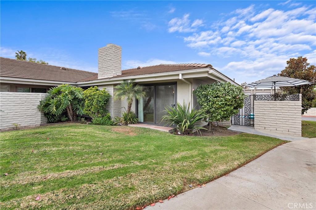 Back side of home. Slider entrance. - 27232 Paseo Burladero B, San Juan Capistrano CA 92675 - photo 4