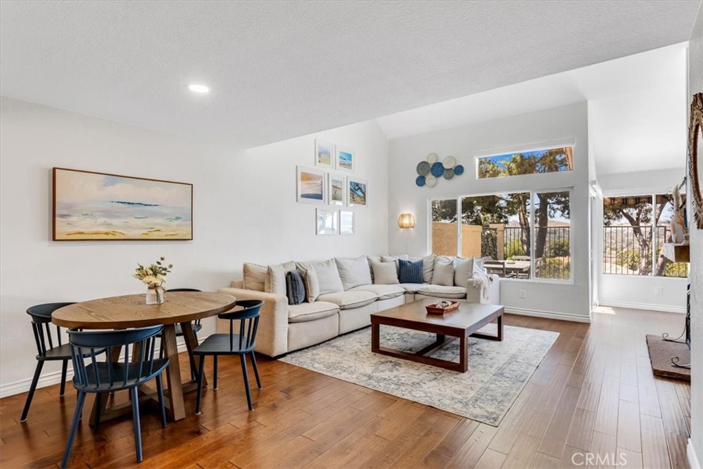 Dining & Living rooms flow openly together to create effortless entertaining options. - 27355 Paseo Laguna, San Juan Capistrano CA 92675 - photo 4