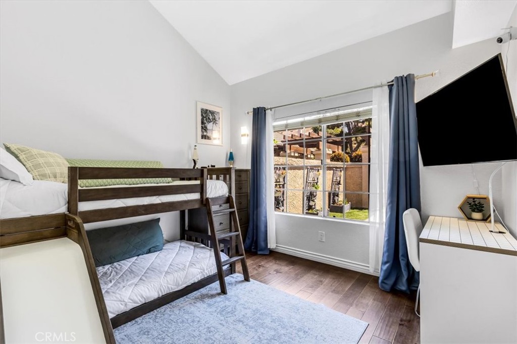 Also on the main level is the spacious second bedroom overlooking the front courtyard. - 27355 Paseo Laguna, San Juan Capistrano CA 92675 - photo 27