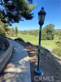 Mesa Vista has a paved "Paseo" walking path that runs the back perimeter of the community overlooking the San Juan Hills - 27355 Paseo Laguna, San Juan Capistrano CA 92675 - photo 49