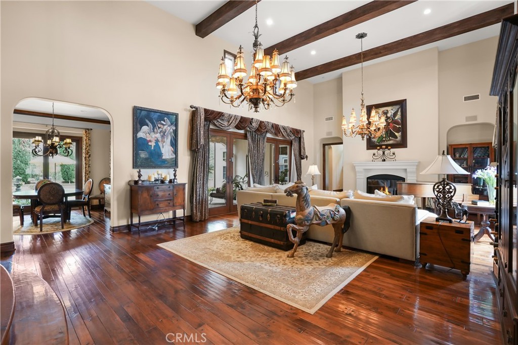Spacious great room offering seamless indoor-outdoor flow, abundant natural light, and timeless finishes throughout. - 27532 Calle De La Rosa, San Juan Capistrano CA 92675 - photo 7