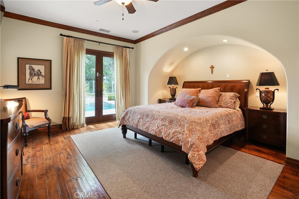 Private main-level primary suite with French doors providing direct access to the backyard retreat. - 27532 Calle De La Rosa, San Juan Capistrano CA 92675 - photo 40