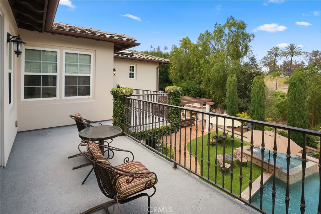 Enjoy tranquil views from the private balcony overlooking the resort-inspired backyard retreat. Image has been digitally - 27532 Calle De La Rosa, San Juan Capistrano CA 92675 - photo 64