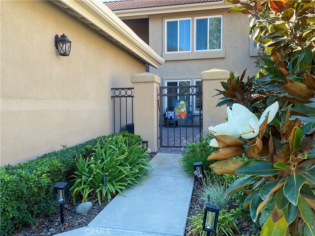 Entering your courtyard. - 27585 Paseo Segovia, San Juan Capistrano CA 92675 - photo 3