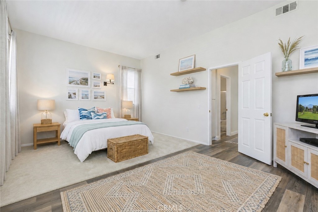 Virtually staged/reimagined primary bedroom - 27971 Via De Costa, San Juan Capistrano CA 92675 - photo 12