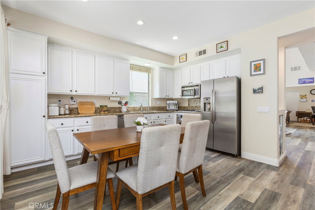 open kitchen to family room - 27971 Via De Costa, San Juan Capistrano CA 92675 - photo 22