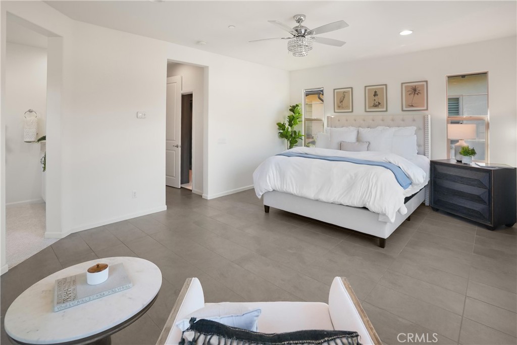 Additional view of the primary suite showcasing its generous proportions, sitting area, and abundant natural light. - 28242 Camino Del Rio, San Juan Capistrano CA 92675 - photo 29