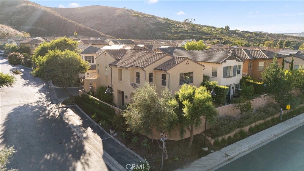 Aerial view showcasing the home within the surrounding neighborhood and scenic hillside setting. - 28242 Camino Del Rio, San Juan Capistrano CA 92675 - photo 41