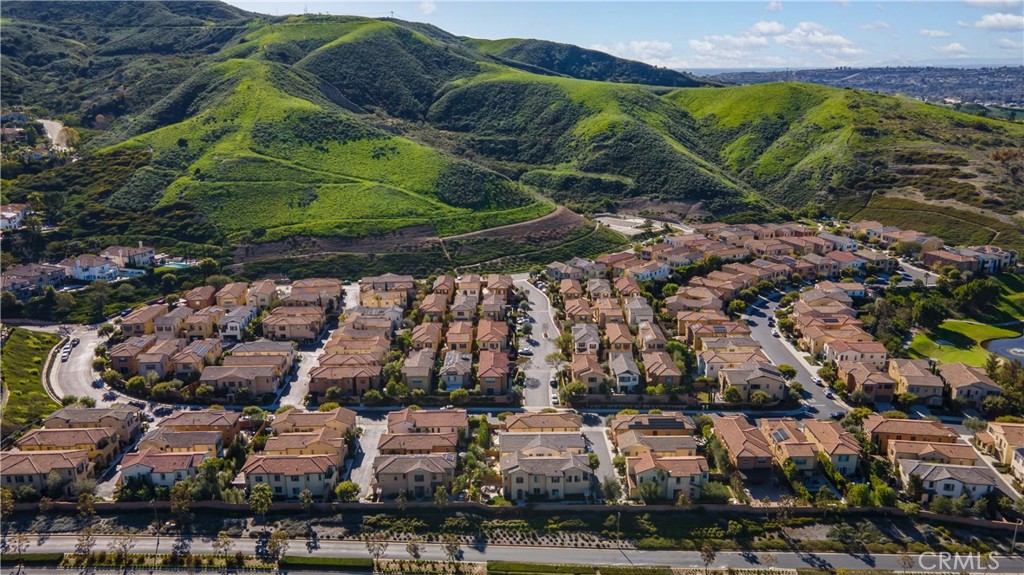 Aerial view showcasing the community nestled against scenic rolling hills. - 28242 Camino Del Rio, San Juan Capistrano CA 92675 - photo 45