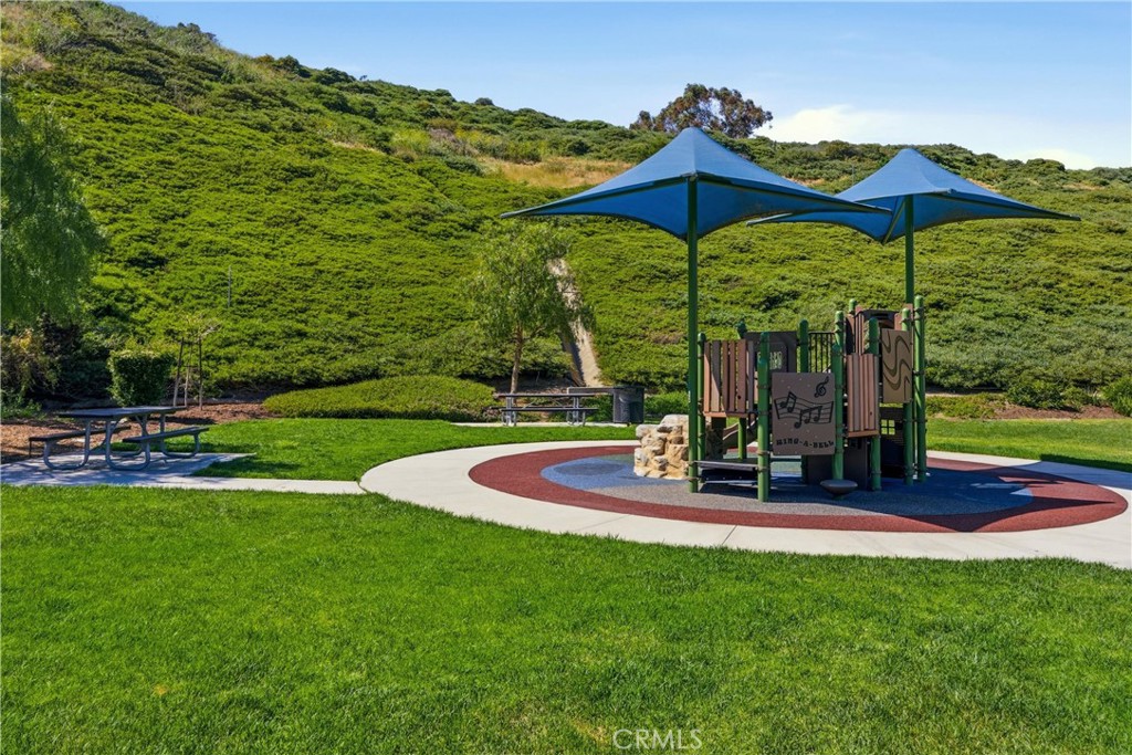 Neighborhood playground and picnic area set against the rolling hills surrounding Campanilla - 28242 Camino Del Rio, San Juan Capistrano CA 92675 - photo 46