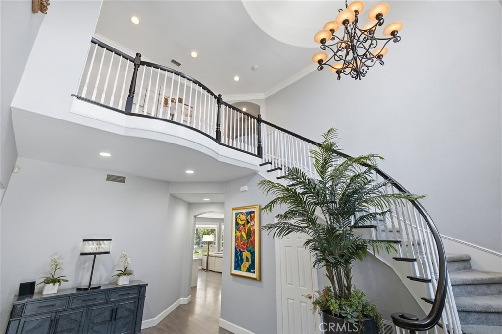 This grand entrance and staircase greet you - 28382 Calle Pinon, San Juan Capistrano CA 92675 - photo 4