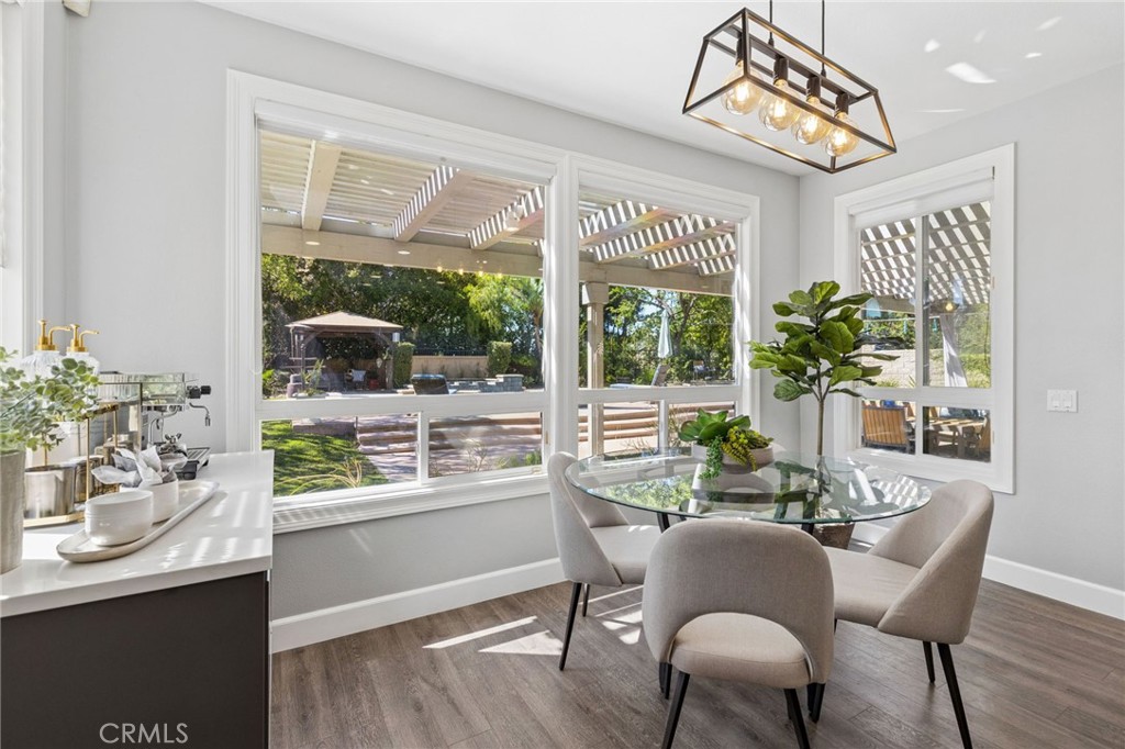Adjoining eat-in kitchen area with beautiful views of the backyrd - 28382 Calle Pinon, San Juan Capistrano CA 92675 - photo 19