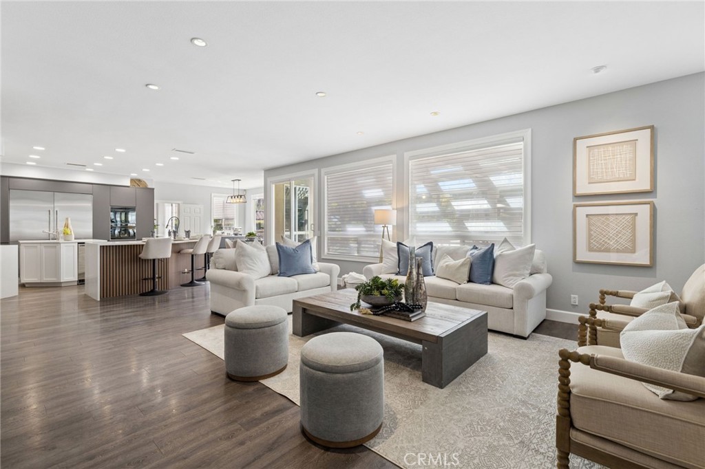 Access the grand backyard through the family room glass doors - 28382 Calle Pinon, San Juan Capistrano CA 92675 - photo 30