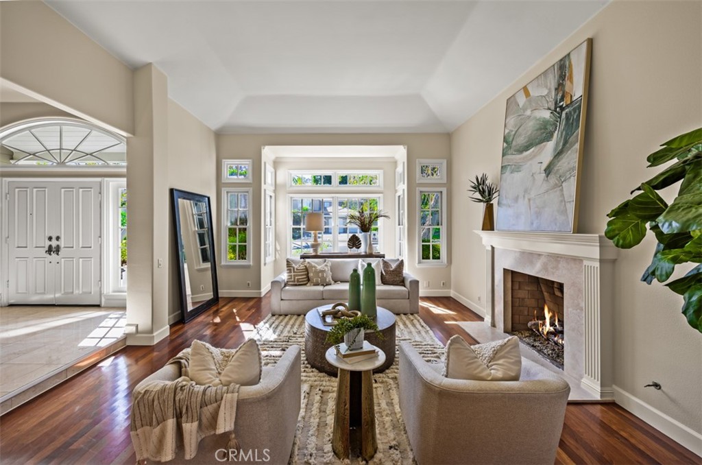 Spacious formal living room with wood burning fireplace - 29902 Hillside Terrace, San Juan Capistrano CA 92675 - photo 20