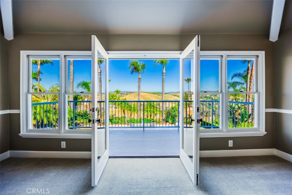 Primary Suite view to large balcony - 29902 Hillside Terrace, San Juan Capistrano CA 92675 - photo 26