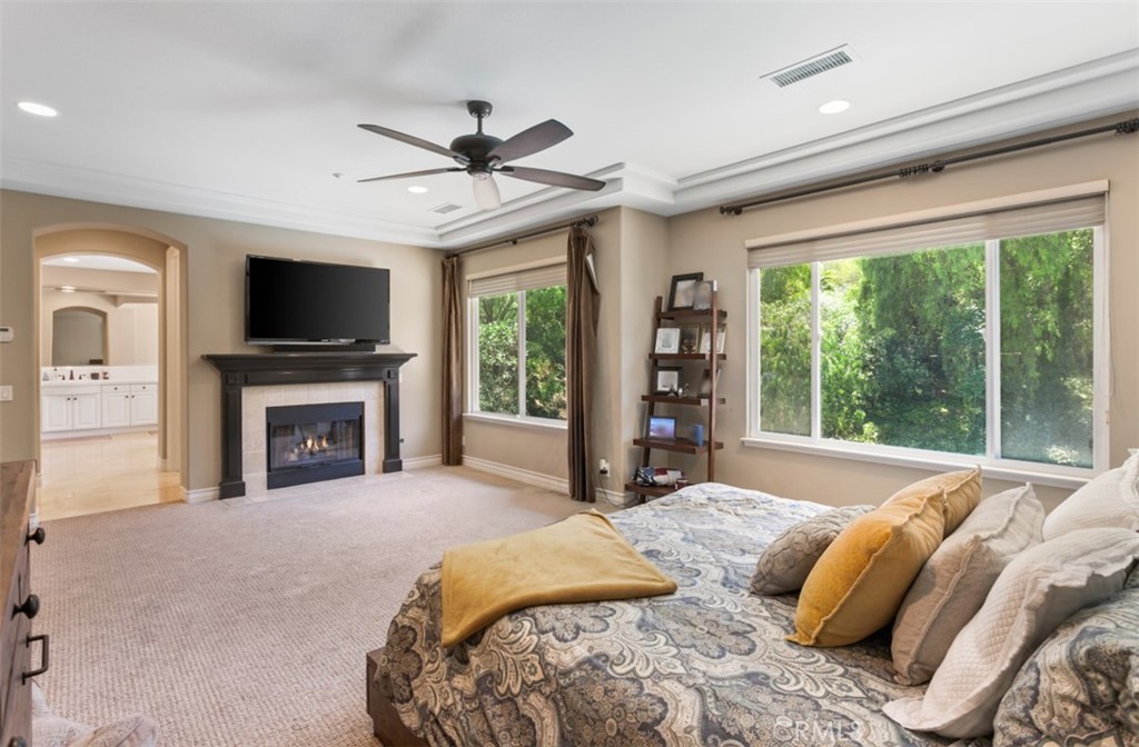 Primary suite with fireplace - 31201 Old San Juan Road, San Juan Capistrano CA 92675 - photo 36
