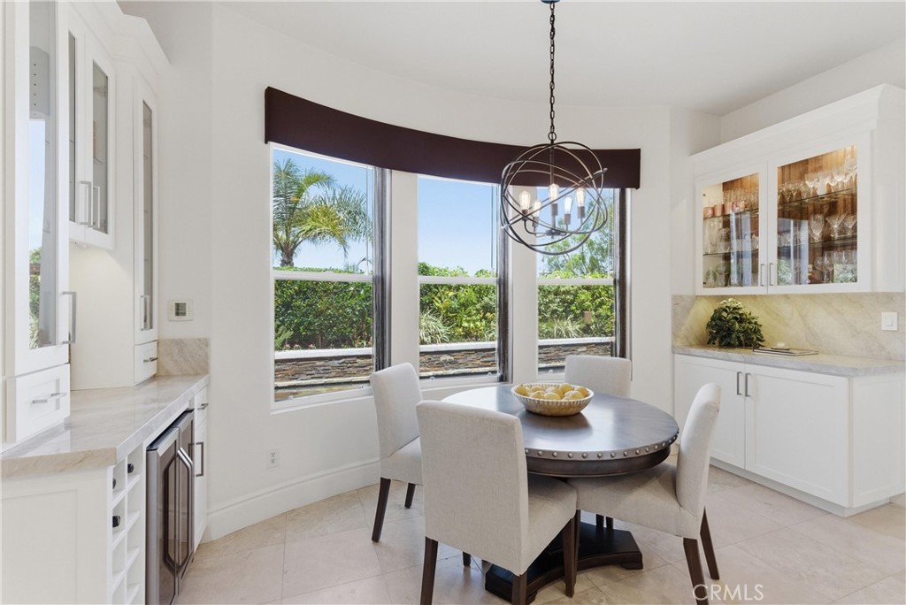 Light-filled breakfast nook overlooking the private backyard - 31251 Calle Bolero, San Juan Capistrano CA 92675 - photo 18