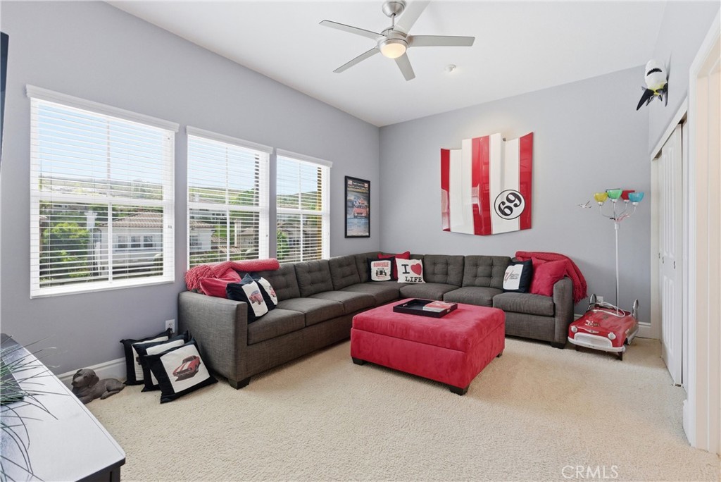Secondary bedroom with multiple windows - 31251 Calle Bolero, San Juan Capistrano CA 92675 - photo 37