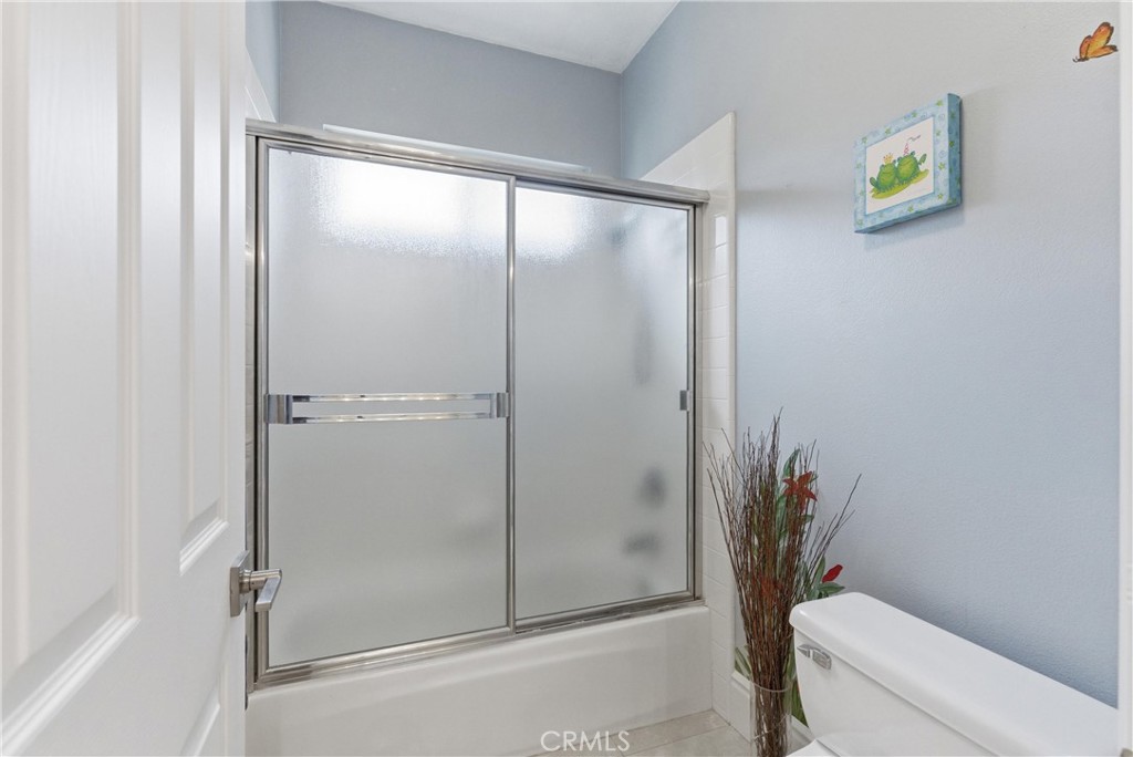 Secondary bathroom with dual vanities, spacious countertops, and functional access connecting the adjoining bedrooms - 31251 Calle Bolero, San Juan Capistrano CA 92675 - photo 39