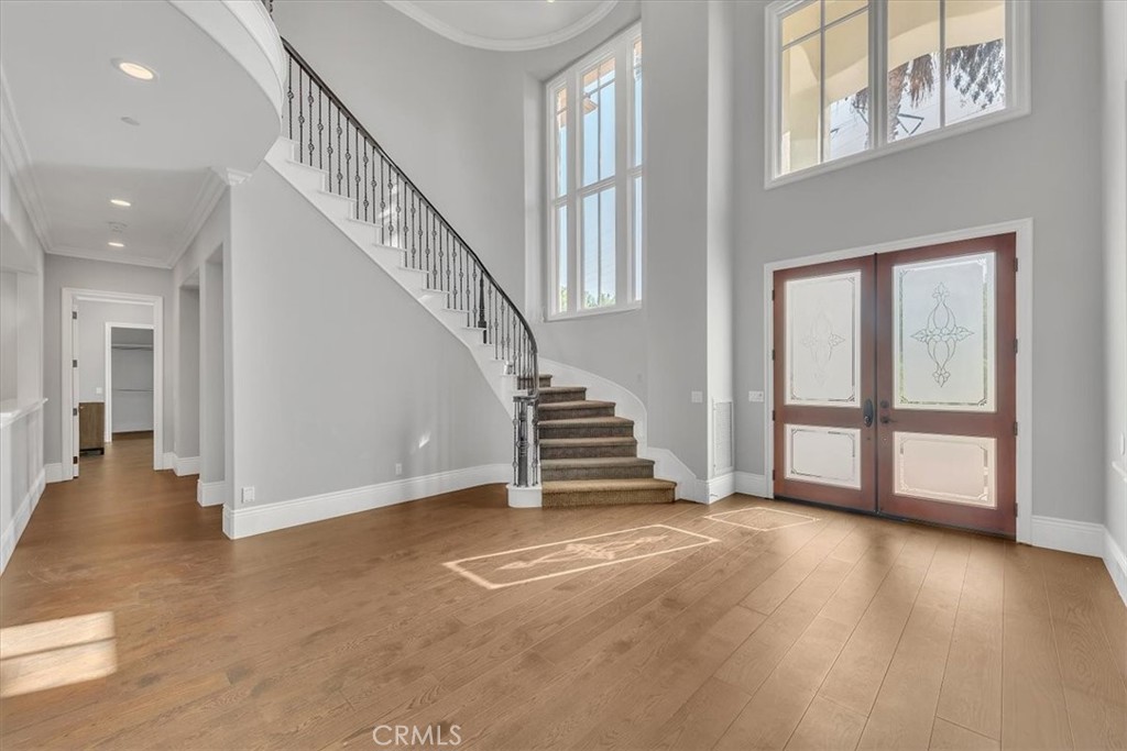 Formal Entry with Double Door Entry, Soaring Two Story Ceilings with a Dramatic Curved Stairase - 31378 Juliana Farms Road, San Juan Capistrano CA 92675 - photo 6