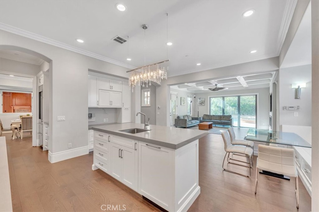 View from second kitchen island toward the family room - 31378 Juliana Farms Road, San Juan Capistrano CA 92675 - photo 12