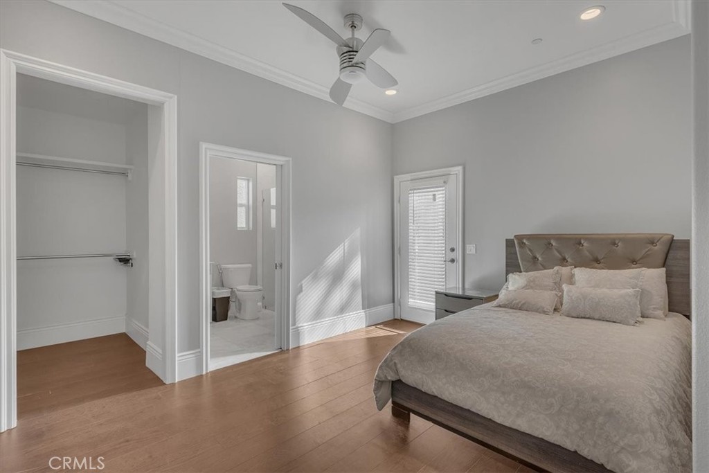 Main Floor Bedroom includes en-suite bath and Walk-in closet. Additional door to the exterior - 31378 Juliana Farms Road, San Juan Capistrano CA 92675 - photo 21