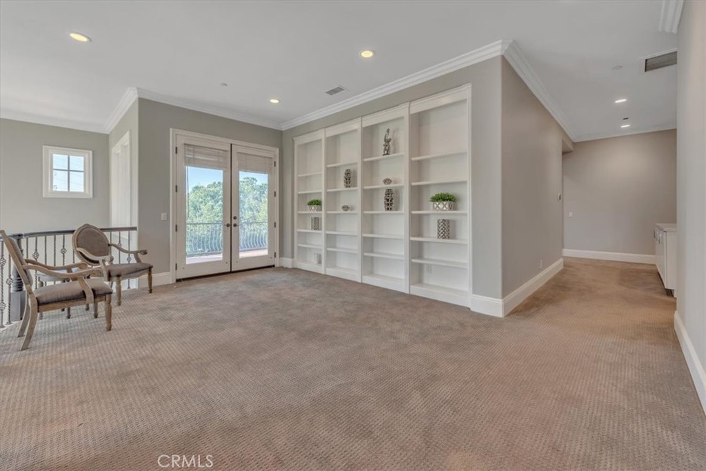 Second level bonus area includes built-in book shelves and balcony - 31378 Juliana Farms Road, San Juan Capistrano CA 92675 - photo 28