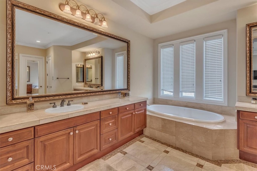 Primary bath includes separate vanities with washbasins - 31378 Juliana Farms Road, San Juan Capistrano CA 92675 - photo 35