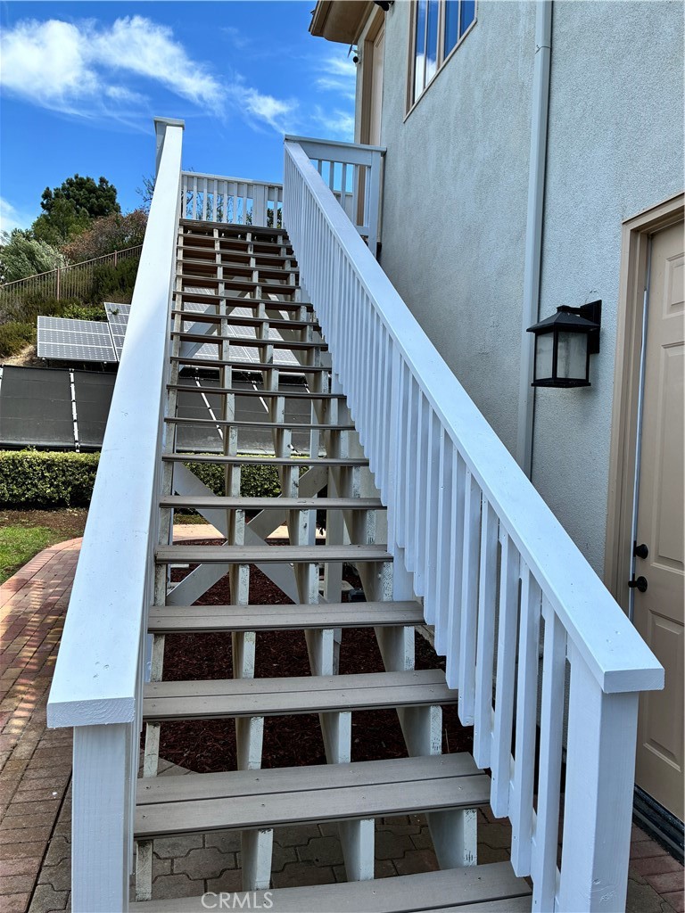 Separate staircase to your in-home movie theatre - 31378 Juliana Farms Road, San Juan Capistrano CA 92675 - photo 44