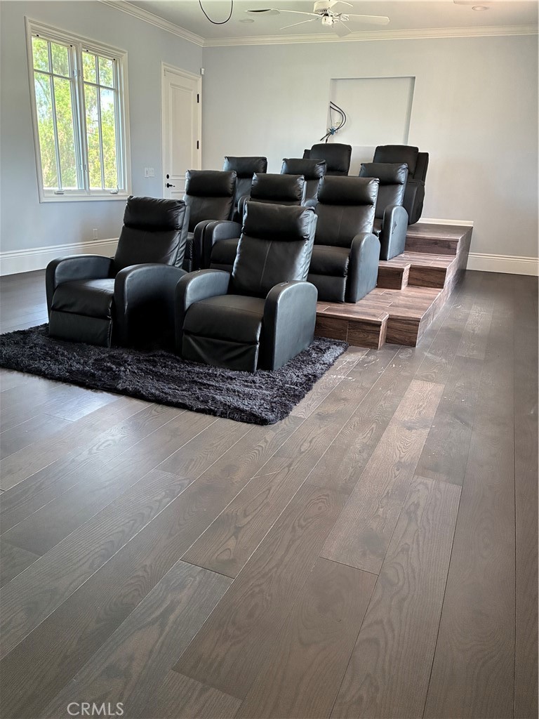 Large Media/Theatre room with movie size screen and television projector and with stadium seating - 31378 Juliana Farms Road, San Juan Capistrano CA 92675 - photo 46