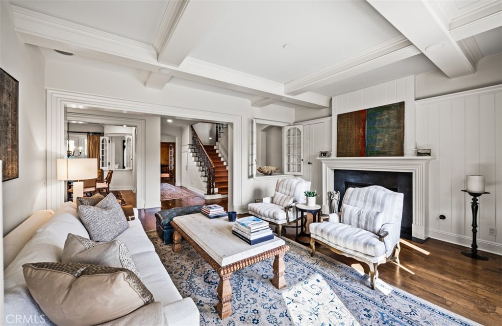 Living room with fireplace and coffered ceiling - 31445 Juliana Farms Road, San Juan Capistrano CA 92675 - photo 13