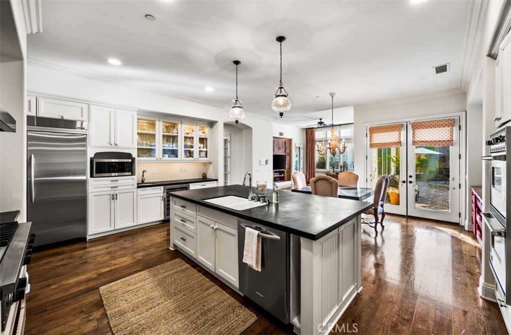 Kitchen view to nook and family room - 31445 Juliana Farms Road, San Juan Capistrano CA 92675 - photo 19