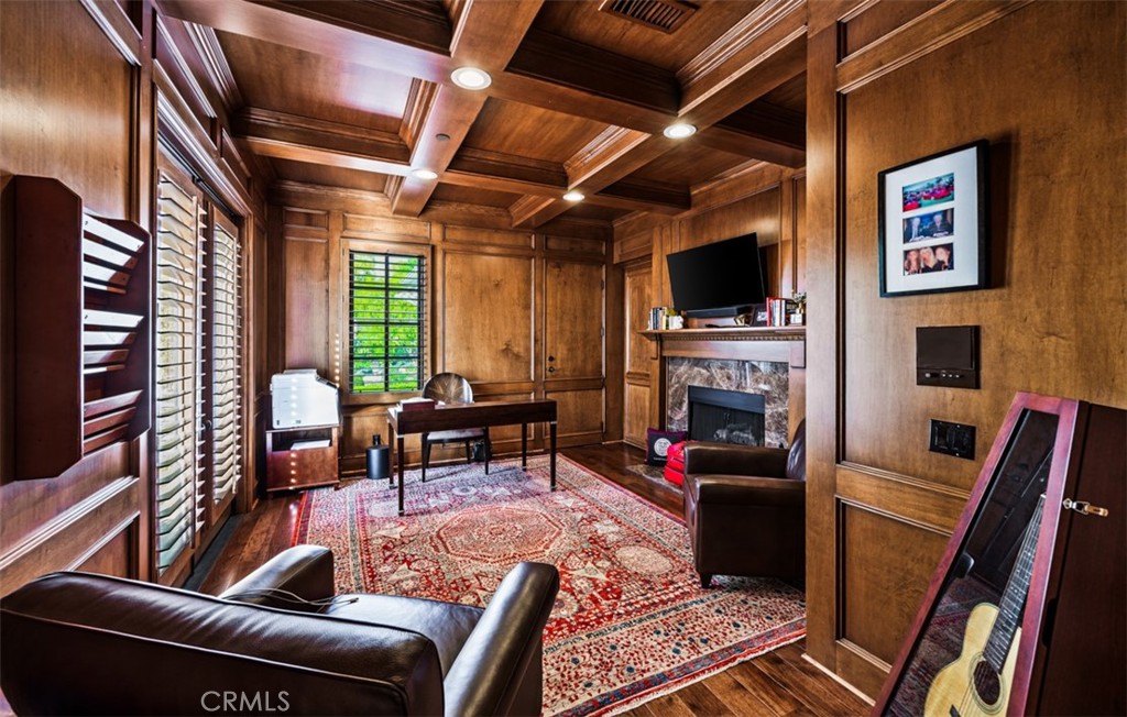 Wood paneled office with court yard entry and fireplace - 31445 Juliana Farms Road, San Juan Capistrano CA 92675 - photo 30