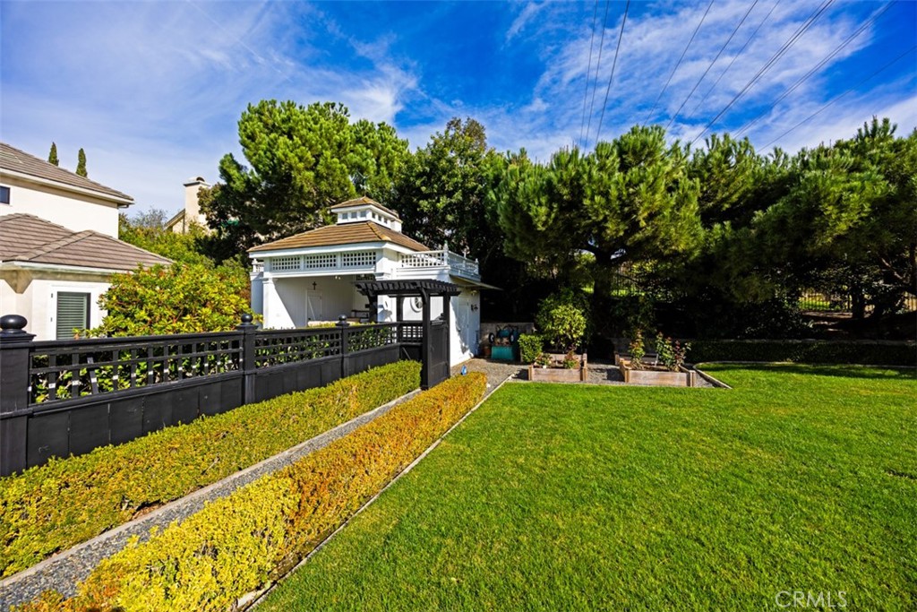 View towards pool house from grassy back yard - 31445 Juliana Farms Road, San Juan Capistrano CA 92675 - photo 55
