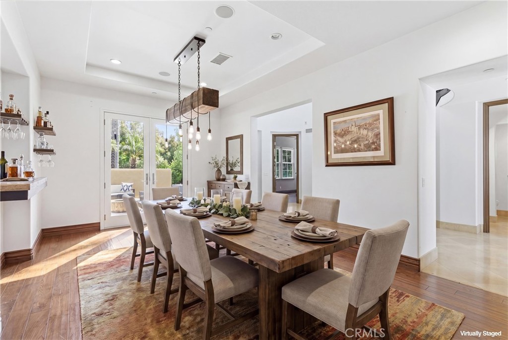 Virtually staged dining room - 31491 Carril De Maderas, San Juan Capistrano CA 92675 - photo 14