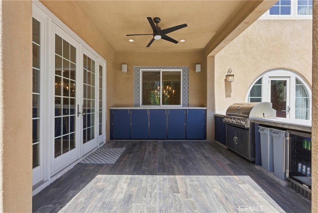 Built-in outdoor kitchen and entertaining patio seamlessly connected to the indoor kitchen and family room, creating eff - 31491 Carril De Maderas, San Juan Capistrano CA 92675 - photo 25