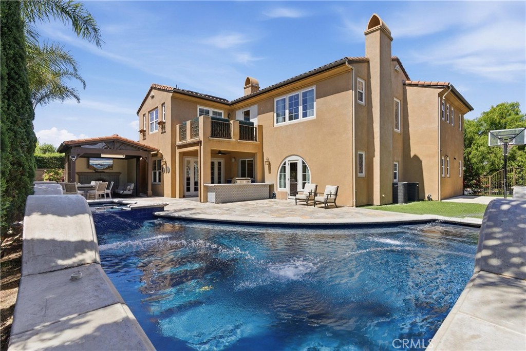 Multiple outdoor entertaining spaces designed for dining, relaxing, and year-round gatherings - 31491 Carril De Maderas, San Juan Capistrano CA 92675 - photo 29