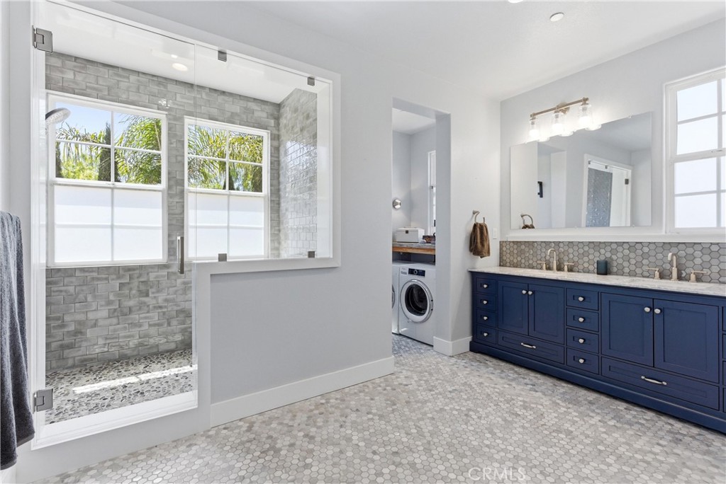 Fully remodeled spa-inspired primary bath featuring dual vanities, designer finishes, oversized walk-in shower, soaking - 31491 Carril De Maderas, San Juan Capistrano CA 92675 - photo 48