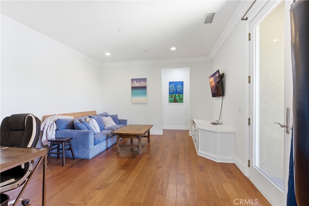 Expansive upstairs bonus room ideal for a media lounge, game room, home office, or additional living space. - 31491 Carril De Maderas, San Juan Capistrano CA 92675 - photo 65