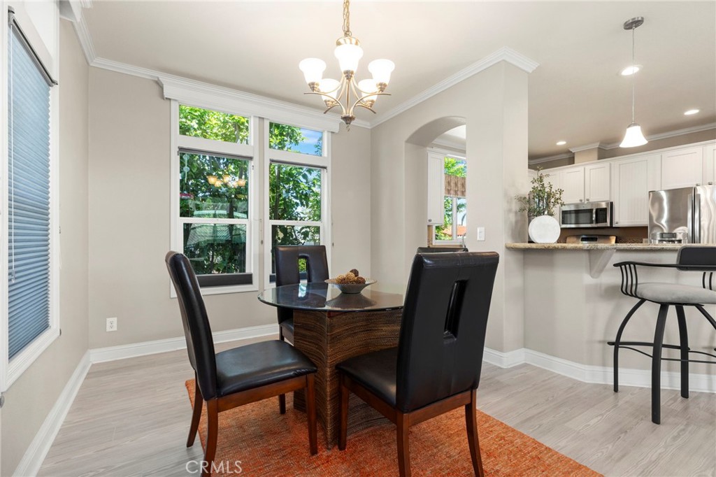 Dining area off kitchen with breakfast bar - 32302 Alipaz 292, San Juan Capistrano CA 92675 - photo 6