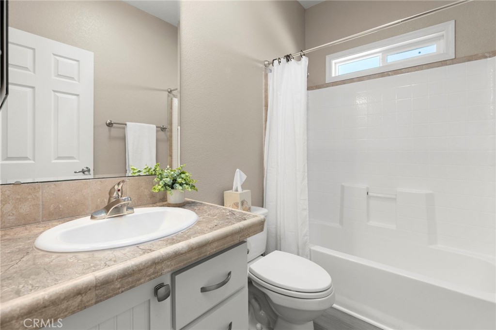 Secondary bath with tub in shower - 32302 Alipaz 292, San Juan Capistrano CA 92675 - photo 19