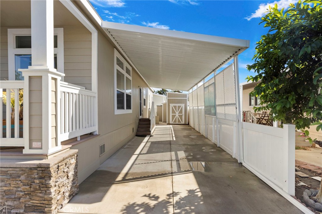 View of carport and shed beyond. - 32302 Alipaz 292, San Juan Capistrano CA 92675 - photo 23