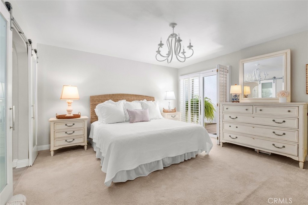 Main bedroom with courtyard. - 32452 Spyglass Court, San Juan Capistrano CA 92675 - photo 19