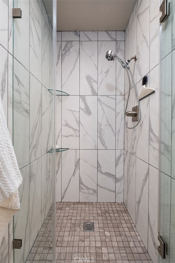Main bathroom shower - 32452 Spyglass Court, San Juan Capistrano CA 92675 - photo 22