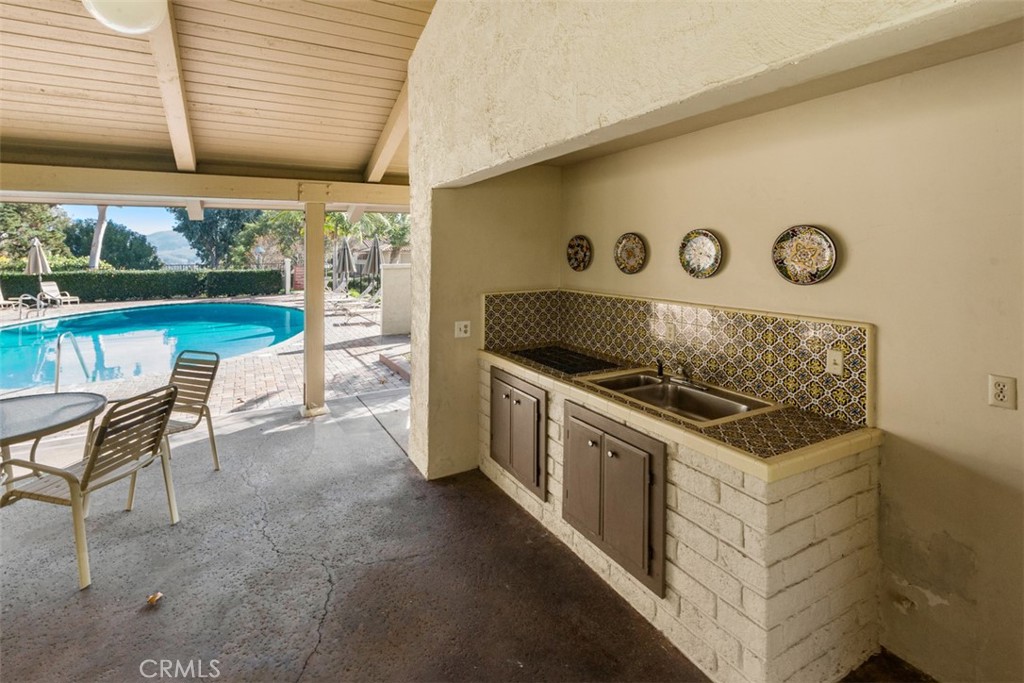 Covered Clubhouse area by the pool for gatherings. - 32452 Spyglass Court, San Juan Capistrano CA 92675 - photo 34